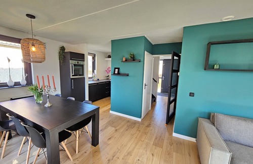 Ewijk Casa | 7 pers house -playground/room, fireplace, porch, close to lake & park facilities
