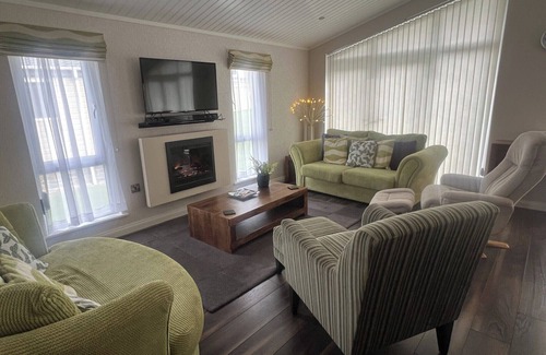 Llanarth Cabina | 71 The Beech House Lodge - A fabulous woodland and coastline escape.