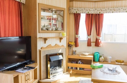 Lowestoft Casa | Caravana de 8 plazas de alquiler cerca de las colinas de madera de placer en Suffolk ref 40093