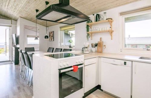 Skastrup Strand Casa | Moderna casa de vacaciones en Bogense con piscina cubierta