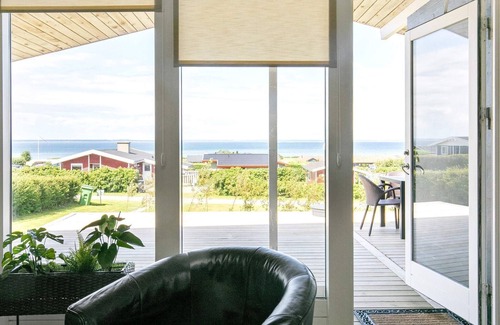 Skastrup Strand Casa | Moderna casa de vacaciones en Bogense con piscina cubierta