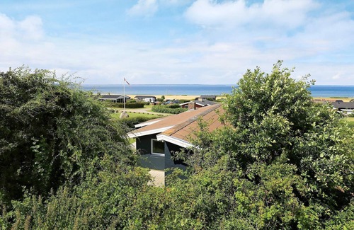 Skastrup Strand Casa | Moderna casa de vacaciones en Bogense con piscina cubierta