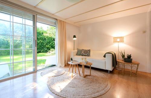 Oisterwijk Chalet De Esquí | 84, gelegen in het rustige & bosrijke Oisterwijk! Met privétuin