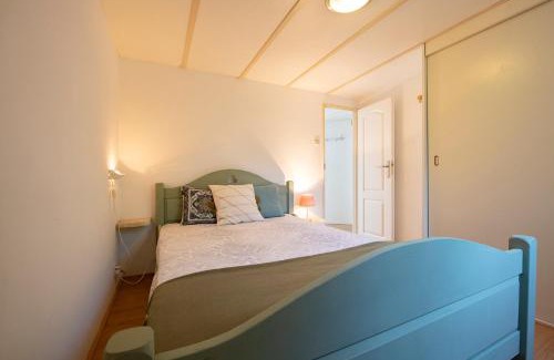 Oisterwijk Chalet De Esquí | 84, gelegen in het rustige & bosrijke Oisterwijk! Met privétuin