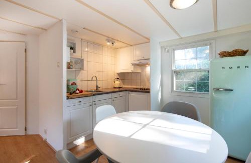 Oisterwijk Chalet De Esquí | 84, gelegen in het rustige & bosrijke Oisterwijk! Met privétuin