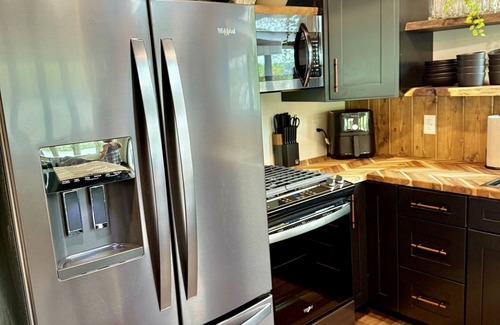 La Follette Cabina | 9 bdrm covered dock, firepit and large bar on water, Baltic hot tub, sleeps 26,