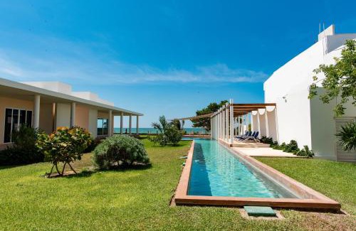 Chicxulub Puerto Casa | 97985 Stunning beachfront Suites Wi-Fi East of Progreso