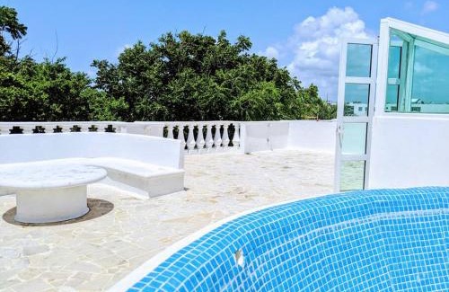 Área de Playacar Fase I Casa | 9br 6ba Large groups! Best location in town Walk to beach, 5th ave Cozumel ferry, shopping, nightlife! Roof plunge pool! Castillo Playacar Fase 1 25max