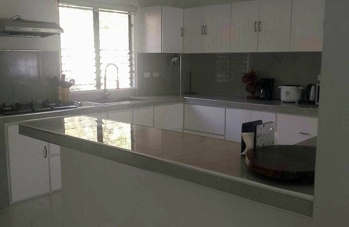 Abra de Ilog Casa | A 3 floor contemporary styled beach house. Steps away from fine white sands!