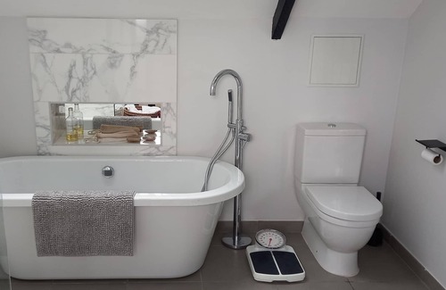 Gouville-sur-Mer Otro | A wonderfully reimagined cottage with pool, hot tub and garden close to the sea.