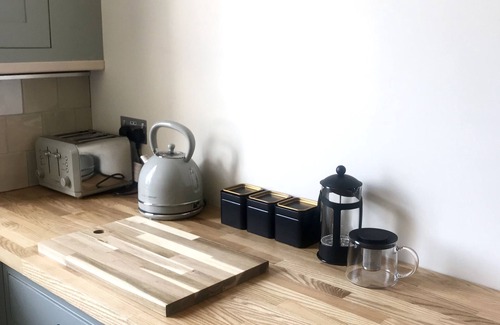 Cheltenham Apartamento | Una hermosa propiedad de regencia de grado II con estacionamiento