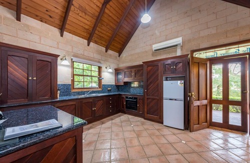 Possum Brush Casa | A beautiful split level sandstone and cedar cottage.