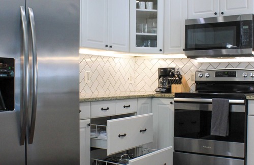 Poiciana Park II Casa | A beautifully renovated private home with a large backyard, Pool, and Hot Tub