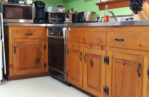 Dumbarton Casa | Una casa limpia, segura, llena de bolas de acero y consolas de juegos vintage