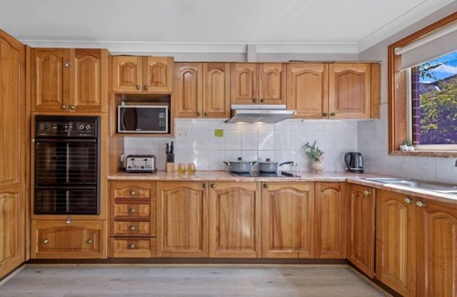 Eastwood Apartamento | A cozy apartment located in the bustling community of Eastwood.