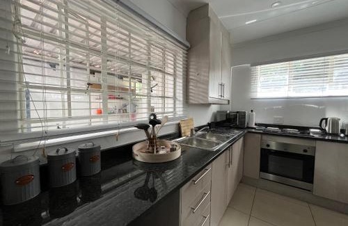 Greater Johannesburg Metropolitan Area Apartamento | A cozy cottage in Bryanston