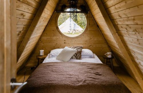 Jubbega Cabina | A-Frame Vijverhuisje met uitzicht over de vijver