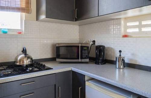 La Quinta Villas Apartamento | Un gran escondite caribeño por un precio asequible
