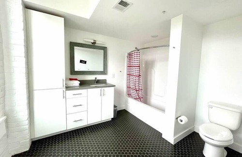 Southeast Omaha Apartamento | A historic Husker themed, 1,300 square foot loft in the heart of the Old Market