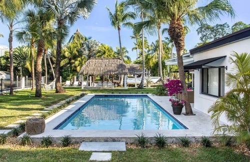 Northeast Miami Villa | A Miracle Waterfront Villa In The Green in Miami!