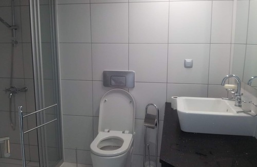 Kiyikislacik Apartamento | Un moderno apartamento de lujo de un dormitorio, en un complejo con vistas al mar Egeo.