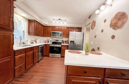 Liberty Area Casa | A one of a kind home with a waffle and coffee bar, life sized games and comfort!