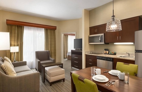 Feather Sound Hotel | A Place You'll Surely Enjoy! Full Kitchen, Free Breakfast, Outdoor Pool!