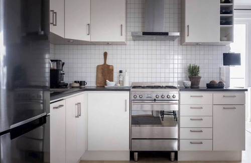 Centrum Apartamento | A top floor duplex with city views and chimney