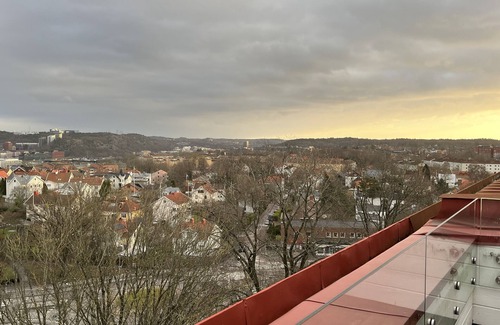 Centrum Apartamento | A top floor duplex with city views and chimney