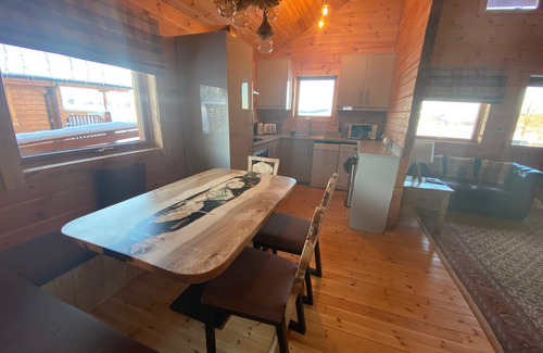 Gorebridge Cabina | A traditional Scandinavian style lodge, with stylish wooden interior decorated with a Scottish theme