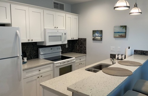 Wheeland Settlement Condominio | Aislado tranquilo 1 dormitorio planta baja frente al mar!