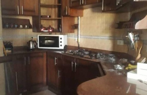 Al Rehab Casa | Un maravilloso apartamento con vista al jardín en la ciudad de Al Rehab