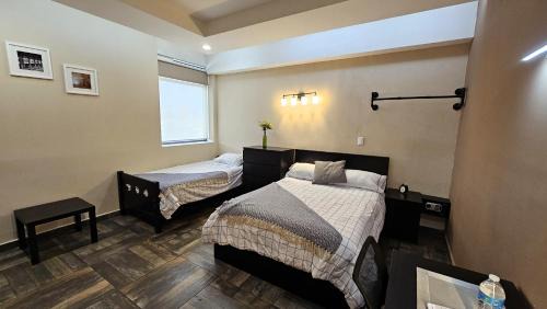 Cuautitlán Izcalli Apartamento | A27 SUITE BLACK PLUS para 1 a 3 personas ESPECIALISTAS EN CORTAS, MEDIANAS Y LARGAS ESTANCIAS IZCALLI perfecto para Familias, Turistas, Contratistas, Estudiantes, Empresas y Ejecutivos A sólo 5 min Izcalli 15 min Esmeralda 20 min Satélite 25 min AIFA
