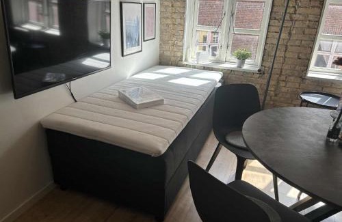 Aalborg Apartamento | Aalborgs mest centrale lille hyggelige New Yorker lejlighed