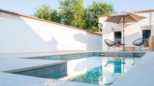 Provincia de Toledo Casa | Acogedora casa de invitados con piscina compartida