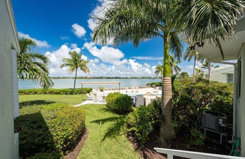 Key West Casa | 3BD/2BA Waterfront Townhome w/ Open Water Views, Beach, and Waterside Pool.