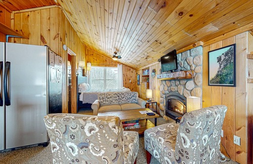 Gilford Cabaña | Adorable cottage with a full kitchen, gas fireplace, pool, koi pond, & gazebo