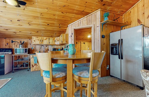 Gilford Cabaña | Adorable cottage with a full kitchen, gas fireplace, pool, koi pond, & gazebo