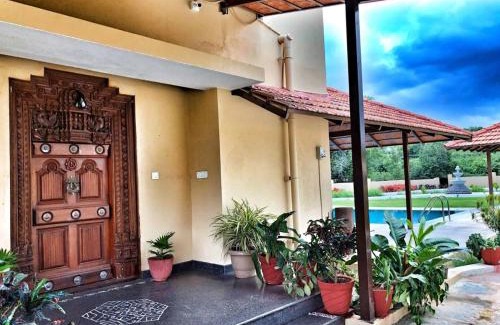 Chikkaballapur Villa | Aeon Root Bridges by Tripture-Villa at Nandi Hills