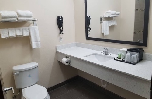 Bay City Hotel | Affordable Room w/ Complimentary Breakfast, Microwave, and Full-Size Fridge