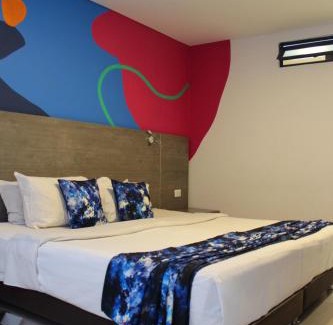 Barrios Unidos Hotel | Agora Suites Self-Service Boutique Hotel