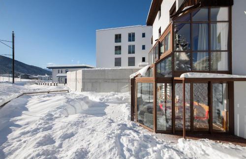 Davos Apartamento | Agrimonia - 5,5-Zi Duplex Wohnung bis 11 Personen mit eigenem Garten