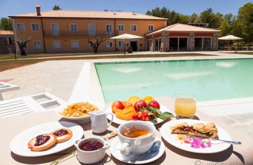 Torre di Ruggiero Casa | Agriturismo Creta Rossa