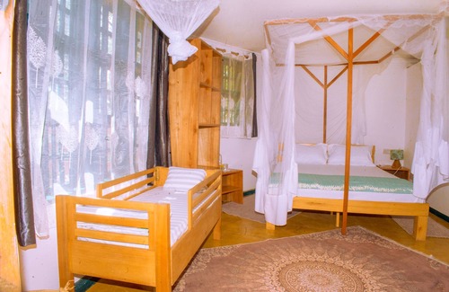 Iringa Cama Y Desayuno | Aika Sunrise Treetops Home