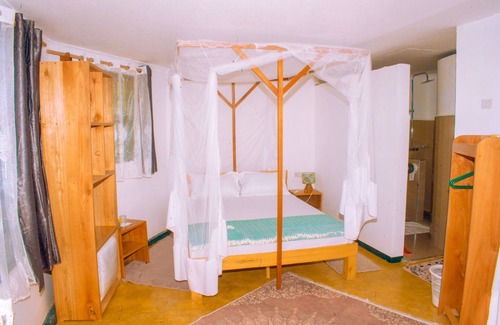 Iringa Cama Y Desayuno | Aika Sunrise Treetops Home