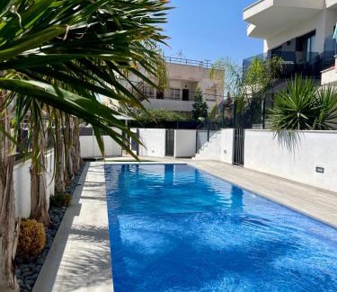 Santiago de la Ribera Apartamento | Air-conditioned Elisa Apartment with spacious sunroof lounge and swimming pool