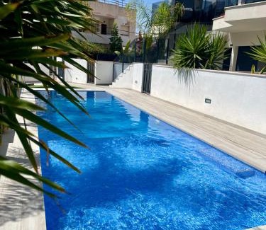 Santiago de la Ribera Apartamento | Air-conditioned Elisa Apartment with spacious sunroof lounge and swimming pool