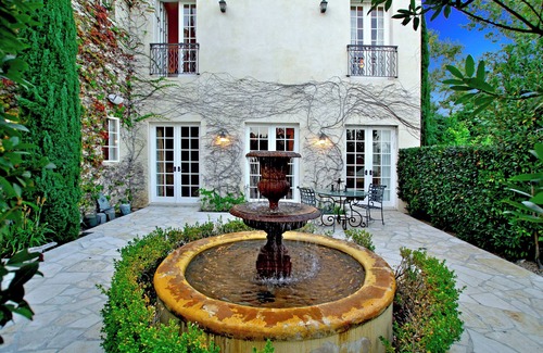 San Juan Capistrano Casa | Aix-en-Provence style French chateau with pool and gardens