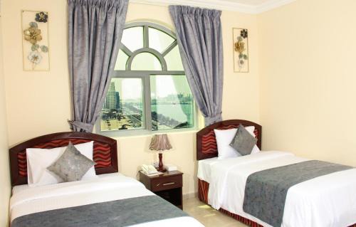 Sharjah Apartamento | Al BARAKAH HOTEL