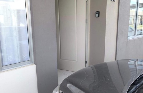 Guácima Casa | Alajuela Stay: Close to Airport, Viva Park & CAR with amenities like pool & gym